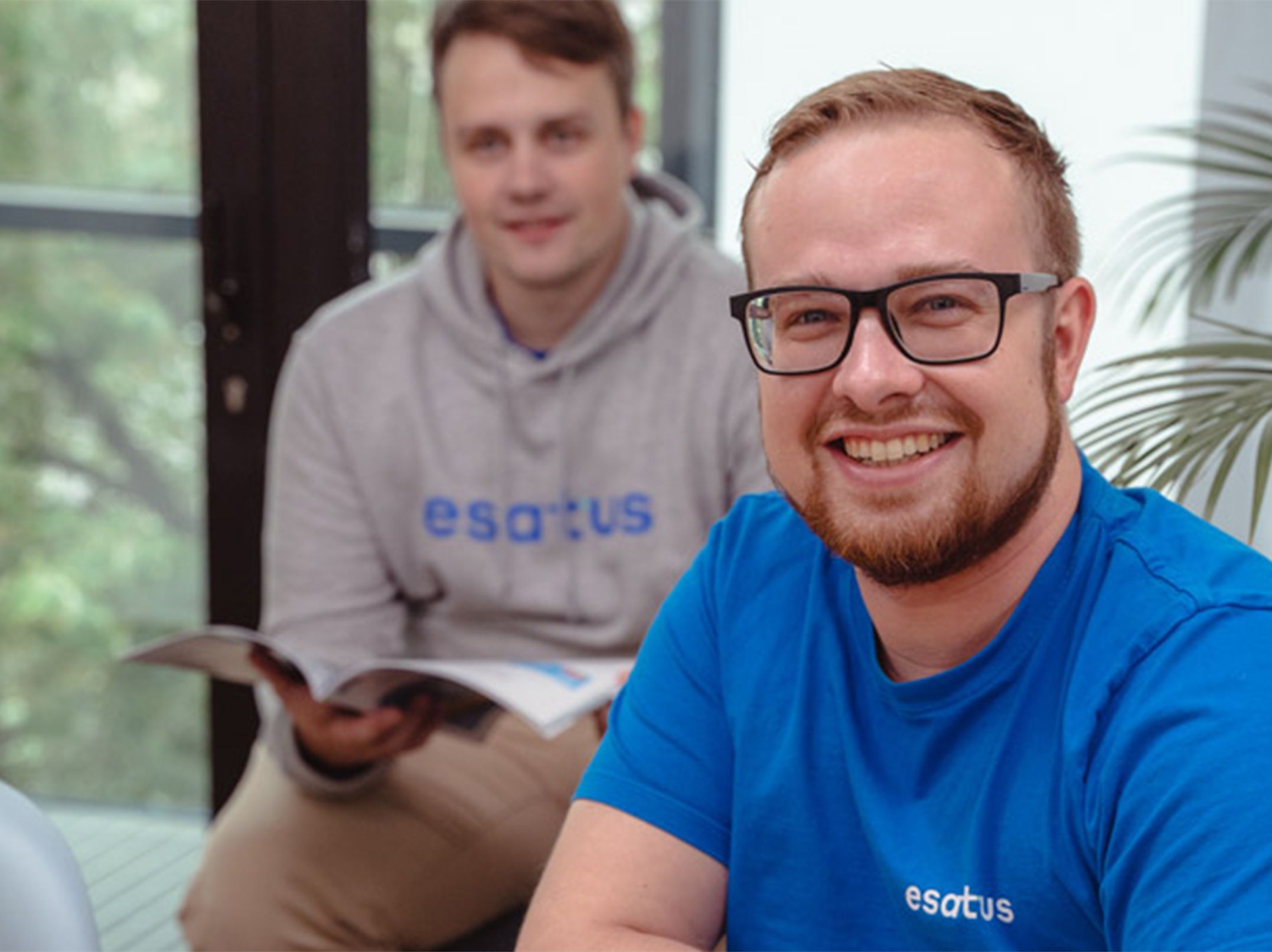 esatus expert and partner reviewing identity standards documentation together